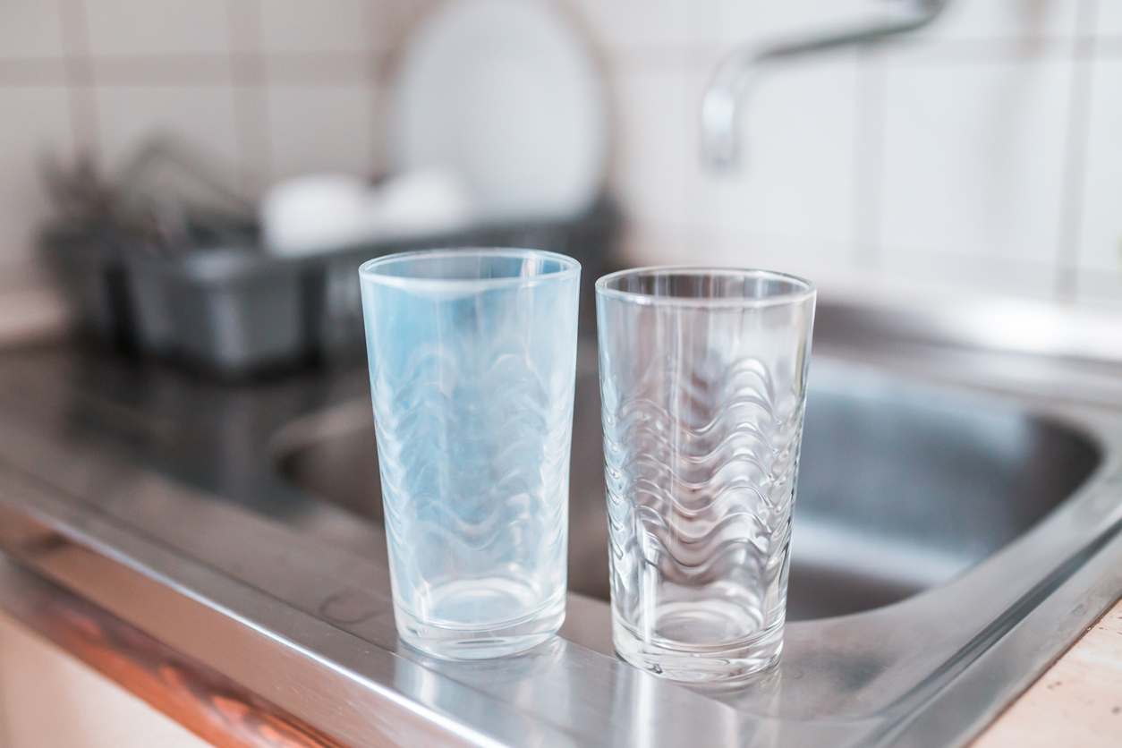 Clean soft water flowing from a tap